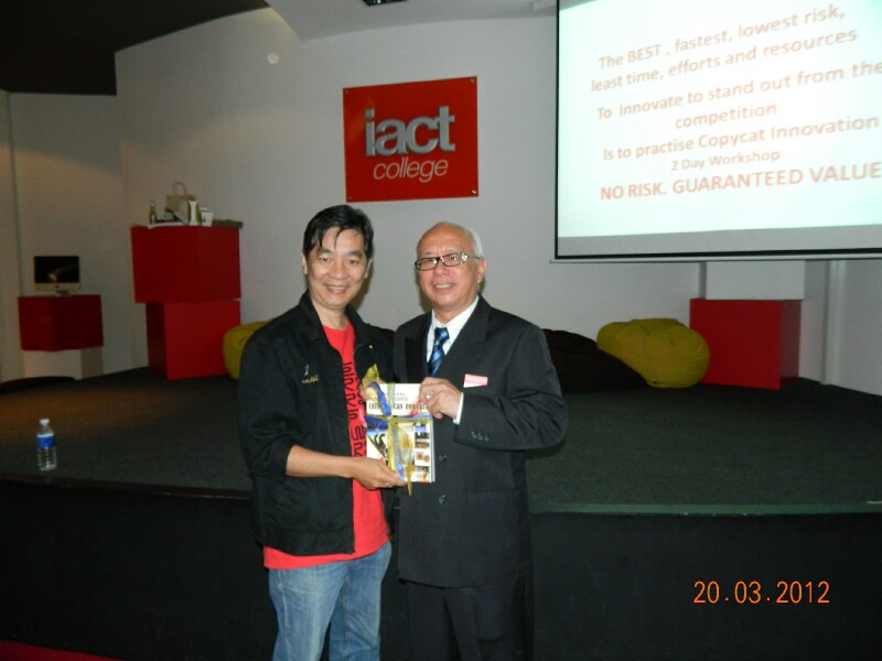 Presenting the memento to Dr YKK Presenting the memento to Dr YKK