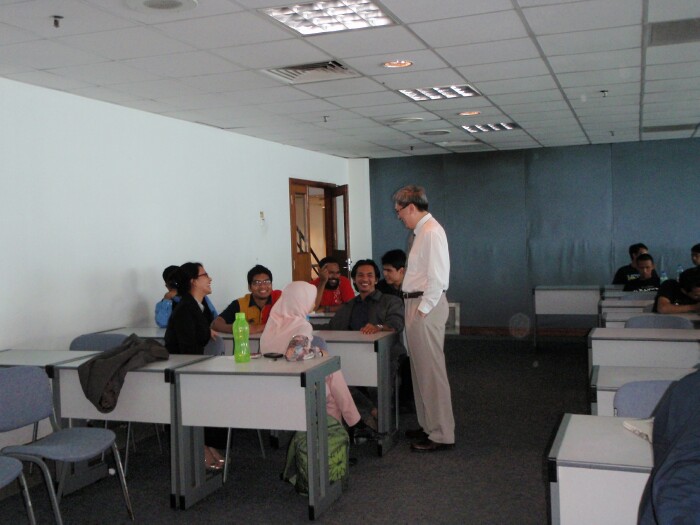 Dr Teoh having a word with the students