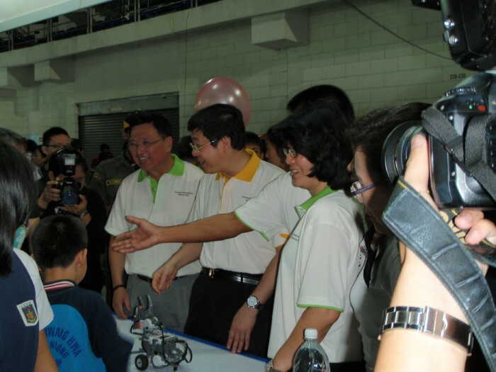admiring the projects of the students admiring the projects of the students